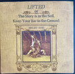 Bright Eyes ‎– Lifted Or The Story Is In The Soil, Keep Your Ear To The Ground
Label:
Dead Oceans ‎– DOC286LP
Format:
2 × Vinyl, LP, Album, Reissue
Country:
US
Released:
11 Nov 2022
Genre:
Rock
Style:
Country Rock, Indie Rock
Lifted Or The Story Is In The Soil, Keep Your Ear To The Ground (Vinyl, LP, Album, Reissue) for sale
More Images

Tracklist
Position	Title/Credits	Duration
A1	The Big Picture
Backing Vocals – Blake Sennett, Jenny Lewis
8:42
A2	Method Acting
Banjo, Bells, Dulcimer [Hammer], Vibraphone, Glockenspiel, Mandolin, Guitar, Dobro, Pedal Steel Guitar – Mike Mogis
Bass – Matt Maginn
Drums – Clay Leverett, Matt Focht
Drums, Featuring – Clark Baechle
Featuring – Clay Leverett
Guitar, Keyboards, Vocals – Andy LeMaster
Piano, Organ, Vocals – Maria Taylor
Trumpet, Vocals – Orenda Fink
3:42
A3	False Advertising
Banjo, Bells, Dulcimer [Hammer], Vibraphone, Glockenspiel, Mandolin, Guitar, Dobro, Pedal Steel Guitar – Mike Mogis
Bass – Casey Scott
Bassoon – Margret Fish
Cello – Gretta Cohn
Choir – A.J. Mogis, Andy LeMaster, Clark Baechle, Jiha Lee, Maria Taylor, Orenda Fink, Todd Baechle
Drums – Clay Leverett, Matt Focht
Drums, Featuring – Clark Baechle
Featuring – Clay Leverett
Flute, Vocals – Jiha Lee
French Horn – Julee Dunekacke
Guitar, Keyboards, Vocals – Andy LeMaster
Oboe – Katie Muth
Piano, Organ, Vocals – Maria Taylor
Trombone – Jason Flatowicz
Trumpet, Vocals – Orenda Fink
Violin – Tiffany Kowalski
5:52
A4	You Will. You? Will. You? Will. You? Will.
Banjo, Bells, Dulcimer [Hammer], Vibraphone, Glockenspiel, Mandolin, Guitar, Dobro, Pedal Steel Guitar – Mike Mogis
Bass – Matt Maginn
Drums – Clay Leverett, Matt Focht
Drums, Featuring – Clark Baechle
Featuring – Clay Leverett
Guitar, Keyboards, Vocals – Andy LeMaster
Piano, Organ, Vocals – Maria Taylor
3:25
B1	Lover I Don't Have To Love
Banjo, Bells, Dulcimer [Hammer], Vibraphone, Glockenspiel, Mandolin, Guitar, Dobro, Pedal Steel Guitar – Mike Mogis
Bass – Matt Maginn
Cello – Gretta Cohn
Drums – Clay Leverett
Drums, Featuring – Clark Baechle
Violin – Tiffany Kowalski
4:00
B2	Bowl Of Oranges
Banjo, Bells, Dulcimer [Hammer], Vibraphone, Glockenspiel, Mandolin, Guitar, Dobro, Pedal Steel Guitar – Mike Mogis
Bass – Matt Maginn
Cello – Gretta Cohn
Drums – Clay Leverett
Drums, Featuring – Clark Baechle
Flute, Vocals – Jiha Lee
Guitar, Keyboards, Vocals – Andy LeMaster
Oboe – Katie Muth
Trumpet, Vocals – Orenda Fink
Violin – Tiffany Kowalski
4:48
B3	Don't Know When But A Day Is Gonna Come
Banjo, Bells, Dulcimer [Hammer], Vibraphone, Glockenspiel, Mandolin, Guitar, Dobro, Pedal Steel Guitar – Mike Mogis
Bass – Matt Maginn
Drums – Clay Leverett
Drums, Featuring – Clark Baechle
Guitar, Keyboards, Vocals – Andy LeMaster
6:31
C1	Nothing Gets Crossed Out
Banjo, Bells, Dulcimer [Hammer], Vibraphone, Glockenspiel, Mandolin, Guitar, Dobro, Pedal Steel Guitar – Mike Mogis
Bass – Casey Scott
Drums – Clay Leverett
Drums, Featuring – Clark Baechle
Flute, Vocals – Jiha Lee
Guitar, Keyboards, Vocals – Andy LeMaster
Oboe – Katie Muth
Piano, Organ, Vocals – Maria Taylor
4:34
C2	Make War
Banjo, Bells, Dulcimer [Hammer], Vibraphone, Glockenspiel, Mandolin, Guitar, Dobro, Pedal Steel Guitar – Mike Mogis
Bass – Casey Scott
Choir [Country] – Andy LeMaster, Jeff Tafolla, Mike Mogis, Robb Bass
Drums – Clay Leverett
Drums, Featuring – Clark Baechle
Guitar – Ted Stevens
Harmonica – Sean Cole
6:16
C3	Waste Of Paint
Featuring – Clay Leverett
6:29
D1	From A Balance Beam
Backing Vocals – Todd Baechle
Bass – Matt Maginn
Drums – Clay Leverett, Matt Focht
Drums, Featuring – Clark Baechle
Featuring – Clay Leverett
Flute, Vocals – Jiha Lee
Guitar, Keyboards, Vocals – Andy LeMaster
Piano – Chris Brooks
Trumpet, Vocals – Orenda Fink
3:40
D2	Laura Laurent
Bass – Casey Scott
Cello – Gretta Cohn
Drums – Clay Leverett, Matt Focht
Drums, Featuring – Clark Baechle
Featuring – Clay Leverett
Oboe – Katie Muth
Piano, Organ, Vocals – Maria Taylor
Violin – Tiffany Kowalski
4:56
D3	Let's Not Shit Ourselves (To Love And To Be Loved)
Bass – Casey Scott
Bassoon – Margret Fish
Drums – Clay Leverett, Matt Focht
Drums, Featuring – Clark Baechle
Featuring – Clay Leverett
Harmonica – Sean Cole
Piano, Organ, Vocals – Maria Taylor
Trombone – Jason Flatowicz
Trumpet, Vocals – Orenda Fink
10:06