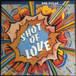 Bob Dylan ‎– Shot Of Love
Label:
Columbia ‎– 88985451011
Format:
Vinyl, LP, Album, Reissue, Stereo
Country:
USA & Europe
Released:
03 Nov 2017
Genre:
Rock, Pop
Style:
Classic Rock
Shot Of Love (Vinyl, LP, Album, Reissue, Stereo) for sale
More Images

Tracklist
Position	Title/Credits	Duration
A1	Shot Of Love
Backing Vocals – Carolyn Dennis, Madelyn Quebec, Regina McCrary
Drums – Jim Keltner
Guitar [2nd Guitar] – Steve Ripley
Lead Guitar – Danny Kortchmar
Vocals – Clydie*
Vocals, Rhythm Guitar – Bob*
4:18
A2	Heart Of Mine
Bass – Donald "Duck" Dunn
Drums – Chuck Plotkin, Jim Keltner
Guitar – Ron Wood
Organ – William Smith (2)
Tom Tom – Ringo Starr
Vocals [2nd Vocal] – Clydie King
Vocals, Piano – Bob Dylan
4:32
A3	Property Of Jesus
Backing Vocals – Carolyn Dennis, Clydie King, Madelyn Quebec, Regina McCrary
Bass – Tim Drummond
Drums – Jim Keltner
Guitar – Danny Kortchmar, Steve Ripley
Piano – Carl Pickhardt
Vocals, Guitar – Bob Dylan
4:33
A4	Lenny Bruce
Backing Vocals – Carolyn*, Clydie*, Madelyn*, Regina*
Bass – Tim*
Guitar – Fred*
Organ – Benmont*
Piano, Vocals – Bob*
4:31
A5	Watered-Down Love
Backing Vocals – Madelyn*, Regina*
Drums – Jim*
Guitar – Danny Kortchmar, Fred Tackett
Piano – Benmont Tench
Vocals – Bob*
Vocals, Backing Vocals – Clydie*
4:13
B1	The Groom's Still Waiting At The Altar	4:02
B2	Dead Man, Dead Man
Alto Saxophone – Steve Douglas
Backing Vocals – Carolyn Dennis, Madelyn Quebec, Regina McCrary
Bass – Tim Drummond
Drums – Jim Keltner
Guitar – Fred Tackett, Steve Ripley
Keyboards – BenTench*, Carl Pickhardt
Vocals [2nd Vocal], Backing Vocals – Clydie King
Vocals, Guitar – Bob Dylan
3:58
B3	In The Summertime
Backing Vocals – Clydie King, Madelyn Quebec, Regina McCrary
Bass – Tim Drummond
Drums – Jim Keltner
Guitar – Danny Kortchmar, Steve Ripley
Keyboards – Benmont Tench
Vocals, Harmonica – Bob Dylan
3:32
B4	Trouble
Backing Vocals – Carolyn*, Clydie*, Madelyn*, Regina*
Bass – Tim*
Drums – Jim*
Guitar [Other Guitar] – Fred*
Keyboards – Benmont*
Lead Guitar – Danny*
Vocals, Guitar – Bob*
4:33
B5	Every Grain Of Sand
Alto Saxophone – Steve Douglas
Backing Vocals – Carolyn*, Madelyn*, Regina*
Bass – Tim*
Drums – Jim*
Organ – Benmont*
Piano – Carl*
Vocals [2nd Vocal] – Clydie*
Vocals, Harmonica – Bob*
6:11
