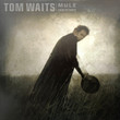 Tom Waits ‎– Mule Variations
Label:
Anti- ‎– 6547-3
Format:
2 × Vinyl, LP, Album, Reissue, Remastered, 180 gram, Gatefold
Country:
Europe
Released:
2017
Genre:
Electronic, Rock, Blues, Folk, World, & Country
Style:
Abstract, Art Rock, Blues Rock
Mule Variations (Vinyl, LP, Album, Reissue, Remastered) for sale
More Images

Tracklist
Position	Title/Credits	Duration
A1	Big In Japan
Bass – Les Claypool
Drums – Brain Mantia*
Guitar – Larry LaLonde, Tom Waits
Saxophone, Trumpet – Ralph Carney
4:05
A2	Lowside Of The Road
Cümbüş [Chumbus], Lute [Dousengoni] – Smokey Hormel
Guitar, Organ [Optigon] – Tom Waits
Programmed By – Jacquire King
Recorded By – Gene Cornelius
Trumpet – Chris Grady
2:59
A3	Hold On
Bass – Larry Taylor
Guitar – Joe Gore, Marc Ribot
Guitar, Organ – Tom Waits
Percussion – Stephen Hodges
5:33
A4	Get Behind The Mule
Bass – Larry Taylor
Blues Harp [Harp] – Charlie Musselwhite
Guitar – Smokey Hormel
Percussion – Stephen Hodges
6:52
B1	House Where Nobody Lives
Bass, Rhythm Guitar – Larry Taylor
Lead Guitar – Marc Ribot
Piano – Tom Waits
4:14
B2	Cold Water
Bass – Larry Taylor
Drums – Christopher Marvin*
Guitar – Marc Ribot, Tom Waits
5:23
B3	Pony
Blues Harp [Harp] – John Hammond*
Dobro – Smokey Hormel
Guitar, Pump Organ – Tom Waits
4:32
B4	What's He Building?
Percussion – Jeff Sloan
Reeds – Ralph Carney
Turntables – DJ M. Mark “The III Media” Reitman*
Voice – Tom Waits
3:20
C1	Black Market Baby
Drums – Andrew Borger
Guitar – Marc Ribot
Guitar, Percussion, Chamberlin – Tom Waits
Reeds – Ralph Carney
Turntables – DJ M. Mark “The III Media” Reitman*
5:02
C2	Eyeball Kid
Bass Clarinet – Ralph Carney
Bassoon – Larry Rhodes (2)
Guitar – Marc Ribot
Percussion – Greg Cohen, Tom Waits
Turntables – DJ M. Mark “The III Media” Reitman*
4:25
C3	Picture In A Frame
Alto Saxophone – Ralph Carney
Baritone Saxophone – Nik Phelps*
Bass – Greg Cohen
Piano – Tom Waits
3:39
C4	Chocolate Jesus
Bass – Greg Cohen
Blues Harp [Harp] – Charlie Musselwhite
Guitar – Tom Waits
3:55
D1	Georgia Lee
Bass – Dalton Dillingham III
Piano – Tom Waits
Violin – Linda Delucia-Gbidossi*
4:24
D2	Filipino Box Spring Hog
Bass, Guitar – Larry Taylor
Drums, Percussion – Andrew Borger
Guitar – Marc Ribot
Harmonica – Charlie Musselwhite
Programmed By – Jacquire King
Trumpet – Chris Grady
Turntables – DJ M. Mark “The III Media” Reitman*
3:09
D3	Take It With Me
Bass – Greg Cohen
Piano – Tom Waits
4:24
D4	Come On Up To The House
Baritone Saxophone – Nik Phelps*
Bass – Larry Taylor
Drums – Andrew Borger
Guitar – Joe Gore
Harmonica – Charlie Musselwhite
Piano – Tom Waits
Saxophone – Ralph Carney
4:36