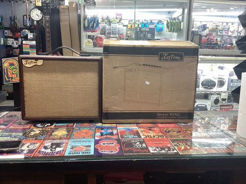 A Kustom 30 watt acoustic guitar/ Mic amp with a headphone input for private practice and two separate volume knobs for the microphone and guitar. And a reverb knob making it perfect for small acoustic shows or one man bands playing at bars or small venues , also has a 4 equalizer knobs for low, low mid, high mid and treble