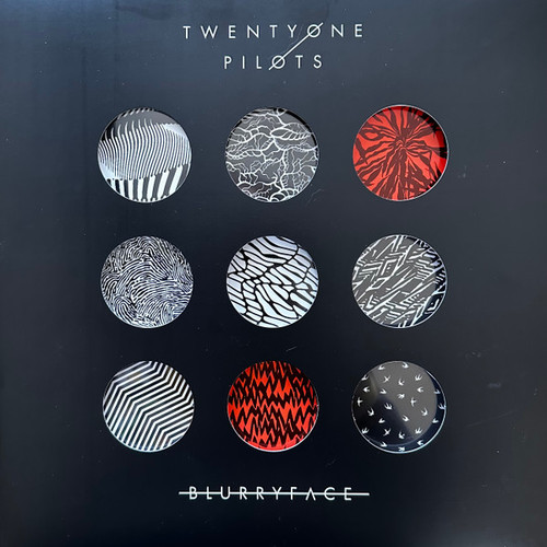 Twenty One Pilots ‎– Blurryface
Label:
Fueled By Ramen ‎– 7567-86696-3
Series:
FBR25 –
Format:
2 × Vinyl, LP, Album, Limited Edition, Reissue, Silver
Country:
USA & Europe
Released:
15 Oct 2021
Genre:
Electronic, Hip Hop, Rock, Pop
Style:
Alternative Rock, Indie Rock, Synth-pop, Pop Rap
Blurryface (Vinyl, LP, Album, Limited Edition, Reissue) for sale
More Images

Tracklist
Position	Title/Credits	Duration
A1	Heavydirtysoul
Drums – Josh Dun
Engineer – Drew Kapner*
Engineer [Assistant] – Michael Peterson (4)
Piano – Tyler Joseph
Producer – Ricky Reed
Programmed By – Ricky Reed, Tyler Joseph
Vocals [Additional] – Ricky Reed
3:55
A2	Stressed Out
Drums – Josh Dun
Electric Upright Bass, Programmed By, Keyboards – Mike Elizondo
Engineer – Adam Hawkins
Engineer [Assistant] – Brent Arrowood
Producer – Mike Elizondo
Programmed By, Keyboards, Vocals – Tyler Joseph
3:22
A3	Ride
Bass – Ricky Reed
Drums – Josh Dun
Engineer – Drew Kapner*, Joe Viers
Engineer [Assistant] – Alex Gruszecki
Organ – Tyler Joseph
Producer – Ricky Reed
Programmed By – Tyler Joseph
3:35
A4	Fairly Local
Bass – Ricky Reed
Drums – Josh Dun
Engineer – Drew Kapner*
Engineer [Assistant] – Alex Gruszecki, Michael Peterson (4)
Producer – Ricky Reed
Programmed By – Ricky Reed, Tyler Joseph
3:27
B1	Tear In My Heart
Bass – Ricky Reed
Drums – Josh Dun
Engineer – Drew Kapner*
Engineer [Assistant] – Alex Gruszecki
Piano – Tyler Joseph
Producer – Ricky Reed
Programmed By – Ricky Reed, Tyler Joseph
3:09
B2	Lane Boy
Bass – Ricky Reed
Drums – Josh Dun
Engineer – Drew Kapner*
Engineer [Assistant] – Michael Peterson (4)
Piano – Tyler Joseph
Producer – Ricky Reed
Programmed By – Ricky Reed, Tyler Joseph
4:13
B3	The Judge
Bass – Mike Crossey
Drums, Percussion – Josh Dun
Engineer – Jonathan Gilmore
Lead Vocals, Backing Vocals, Ukulele, Organ, Piano – Tyler Joseph
Producer – Mike Crossey
Programmed By – Mike Crossey
Synth – Mike Crossey, Tyler Joseph
Vocals [Gang] – Jonathan Gilmore, Josh Dun, Mike Crossey, Tyler Joseph
4:58
C1	Doubt
Backing Vocals – LunchMoney Lewis
Engineer – Drew Kapner*
Engineer [Assistant] – Michael Peterson (4)
Producer – Ricky Reed
Programmed By – Ricky Reed, Tyler Joseph
Vocals [Additional] – Ricky Reed
3:12
C2	Polarize
Bass, Synth [Synth Bass], Keyboards – Mike Elizondo
Drums – Josh Dun
Engineer – Adam Hawkins
Engineer [Assistant] – Brent Arrowood
Producer – Mike Elizondo
Synth [Synth Bass], Programmed By [Programming], Keyboards, Vocals – Tyler Joseph
3:47
C3	We Don't Believe What's On TV
Bass – Ricky Reed
Drums – Josh Dun
Engineer – Drew Kapner*
Engineer [Assistant] – Victor Luevanos
Producer – Ricky Reed
Ukulele – Tyler Joseph
2:57
C4	Message Man
Engineer – Chris Spilfogel
Engineer [Assistant] – Seth Perez
Producer – Tim Anderson (5)
Synth, Programmed By – Tim Anderson (5)
4:00
D1	Hometown
Drums – Josh Dun
Engineer – Adam Hawkins
Engineer [Assistant] – Brent Arrowood
Guitar, Bass, Programmed By, Keyboards – Mike Elizondo
Producer – Mike Elizondo
Programmed By, Keyboards, Piano, Vocals – Tyler Joseph
3:55
D2	Not Today
Drums, Vocals – Josh Dun
Engineer – Adam Hawkins
Engineer [Assistant] – Brent Arrowood
Guitar, Bass, Programmed By, Keyboards, Vocals – Mike Elizondo
Piano, Vocals – Tyler Joseph
Producer – Mike Elizondo
Tenor Saxophone, Alto Saxophone, Baritone Saxophone, Flute – David Moyer
Trumpet, Trombone, Euphonium – Danny T. Levin
3:58
D3	Goner
Bass – Ricky Reed
Drums – Josh Dun
Engineer – Drew Kapner*
Engineer [Assistant] – Victor Luevanos
Piano – Tyler Joseph
Producer – Ricky Reed
Programmed By – Ricky Reed