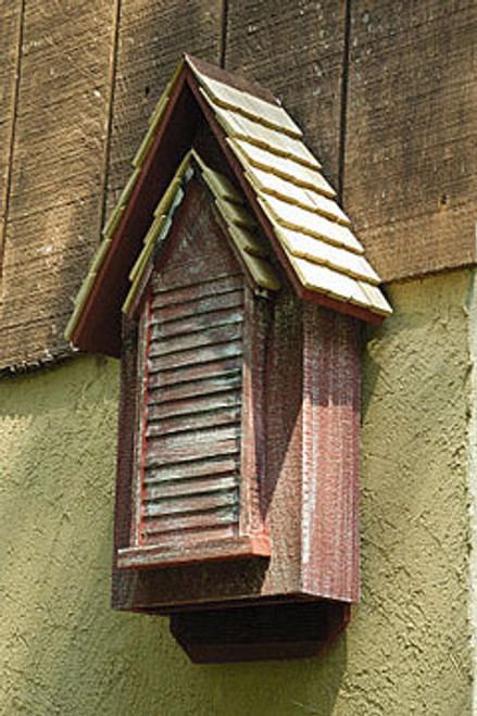 Heartwood Victorian Bat House, Red, 100 bats
The Heartwood Victorian Bat House features two chambers and holds 100 bats. Function meets architectural styling with this bat shelter. The steeply pitched, shingled roof has a ventilation gap in the easement and a copper ridge. It is divided into two vertical chambers, each of which measure 1.25" deep. A piece of rough wood separates the chambers to allow bats to cling when roosting. It is best to face the house toward the south or southeast, approximately 15 to 20 feet above the ground. This bat house is hand-crafted in the USA.

Bats that use this house:
big brown, cave, eastern pipistrelle, evening, little brown, Mexican free-tailed, northern long-eared, pallid, Pallas' mastiff, Rafinesque's big-eared, southeastern, and Yuma bat

Capacity: 100 bats
Dimensions: 15"W x 6"D x 28"H
Mounting: tree, building, or pole mount
Construction: rough cut cypress
Shipping Weight: 15 lbs