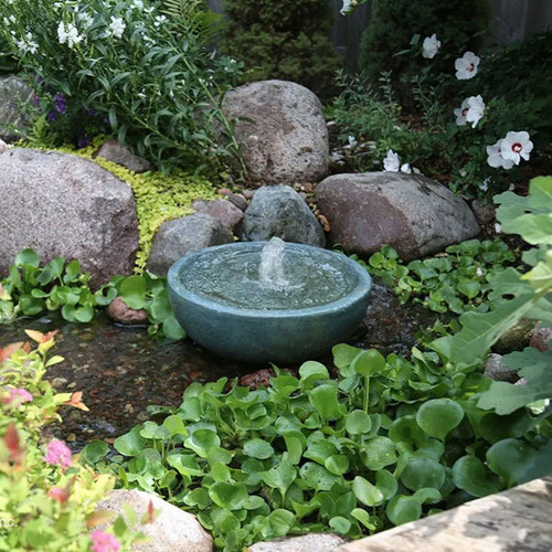 The Aquascape Spillway Bowl 21" creates a beautiful overflowing water feature that allows for a variety of installation possibilities. It fits great into small spaces and can be installed as a standalone feature using an Aquascape AquaBasin or installed into an existing pond. Made from durable GFRC, it is easy to install and built for years of trouble-free enjoyment. Its unique patina allows the basin to blend naturally into any environment. The included standpipe provides multiple options for adjusting the water flow after installation. Combine the Spillway Basin 21" with the Spillway Bowl 19", Spillway Bowl Stand 6", and an AquaBasin for an incredible standalone feature that is sure to impress.  

Cast concrete is a hand-finished process. As such, GFRC finishes will vary by unit. There will be a color variance of up to 15% in each unit. There may also be uneven texture or pattern as well as small holes in the surface caused by air or water trapped on the surface during casting. This is a normal trait of cast concrete and is not covered under warranty.

Recommended pump – Ultra 800 Water Pump

Can be installed as a standalone feature or added to existing water features
Wide variety of installation possibilities
Plumbing included for quick and easy installation
Unique and beautiful patina
Dimensions: 21"D x 6.9"H