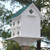 Wing and A Prayer Purple Martin Mansion with Verdigris Roof. This dramatic structure brings excitement and dazzling architecture to your bird garden, for seasons of enjoyment. The significant white home is crafted from PVC trimboard, designed to withstand the elements and resist mold, mildew, and delamination, for a virtually maintenance-free roost. Each of the ten apartments has an individual 2" diameter opening, surrounded by verdigris colored metal to deter predators. Individual balconies beneath the openings on the second and third floors offer male martins their own territory, discouraging porch dominance disputes. The base of the home has a full platform around it for additional perching area. A steeply pitched, PVC roof protects the home, while its light green color offers both grace and style. Ventilation gaps beneath the roof overhang help each nest stay cool, protecting the hatchlings, and each compartment measures approximately 5.5" long, 5.75" wide, and 5.75" tall. The roof can also be removed for seasonal cleaning, and each of the floors lifts out of the home for thorough nest checks. An attached collar at the base helps the structure mount to a true 4" x 4" post (not included), and attached brackets add more support. The white and verdigris color scheme offers an antique feel, and the PVC body will last for several seasons. Enjoy a lovely home and the soothing sounds of martins in your yard with this Purple Martin Mansion with Verdigris Roof.