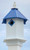 Wing & A Prayer Bluebird Hexagonal House, Cobalt Blue Roof
Highlight vivid colors, lasting materials, and your love of birds by adding this Wing and A Prayer Bluebird Hexagonal House with Cobalt Blue Roof to your yard. Placing this six sided unit within your landscaping provides small songbirds a welcome rest, and lends a bright look to the area. The 1.5" diameter entry hole sits high on the white, PVC body, creating a deep nest box design that helps keep bluebird or other nestlings safe from predators. The hexagonal roof and extended base plate further the geometric hint, and a top, wooden finial completes the piece. The blue finish on this PVC roof, its metal tines, and the metal guard around the entry hole lend wonderful, jewel tones to the unit, and the finial removes from the roof for nest checks. Slide the attached mounting collar over a true 4" x 4" post to situate this shelter at a great height for your feathered friends. The PVC lumber construction remains lovely without peeling, rotting, or delaminating, and the white and blue colors make a bold statement with ease. Adorn your garden with a dynamic new roosting spot using this Bluebird Hexagonal House with Cobalt Blue Roof. Made in the USA.

Opening: 1.5" dia.
Dimensions: 8.75"L x 10.25"W hexagonal base x 18"H
Mounting: mount on 4" x 4" post
Construction: PVC, metal, wood