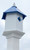 Wing & A Prayer Sycamore Bird House, Cobalt Blue Roof
Provide lasting protection and shelter for two small songbird families by adding this Wing and A Prayer Sycamore Bird House with Cobalt Blue Roof to your backyard sanctuary. The bright color scheme and contemporary materials combine to form a durable nesting site, while creating a bold statement in your landscaping. The white, hexagonal PVC body has plenty of room for two avian families, and dual, 1.5" diameter entry holes on opposite sides of the shelter provide passage to wrens and chickadees. A deep blue, metal plate surrounds each entry hole, preventing woodpeckers and other birds from enlarging them, and each rests near the roof for a deep nesting area. The hexagonal, PVC roof keeps the interior dry and warm for your feathered friends, and its classic blue finish and metal tines lend extra angles and visual interest. An extended, bottom platform creates perching area, and the top, wooden finial brings height to the unit. This topper can also be removed for seasonal nest checks, and its white color matches that of the shelter. Slide the bottom mounting collar over a true 4" square post for a convenient and lasting display. The PVC body and roof ensure style and longevity, without peeling, rotting, or delaminating from exposure to the elements. Bring a bit of divine style and vivid colors to your bird garden with this Sycamore Bird House with Cobalt Blue Roof. Made in the USA.

Openings: 1.5" dia.
Dimensions: 9.75"L x 11.25"W hexagonal base x 19.75"H
Mounting: mount on 4" x 4" post
Construction: PVC, metal, wood