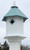 Celebrate protective trees and provide lasting shelter to two small songbird families by adding this Wing and A Prayer Sycamore Bird House with Verdigris Roof to your backyard sanctuary. The classic color scheme and contemporary materials combine to form a durable nesting site, while creating a fantastic statement in your landscaping. The white, hexagonal PVC body has plenty of room for two avian families, and dual, 1.5" diameter entry holes on opposite sides of the shelter provide passage to wrens and chickadees. A light green, metal plate surrounds each entry hole, preventing woodpeckers and other birds from enlarging them, and each rests near the roof for a deep nesting area. A hexagonal, PVC roof keeps the interior dry and warm for your feathered friends, and its textured, light green finish and metal tines lend extra angles and visual interest. An extended, bottom platform creates perching area for small birds, and the top, wooden finial adds height to the unit. This topper can also be removed for seasonal nest checks, and its white color matches that of the shelter. Slide the bottom mounting collar over a true 4" square post for a convenient and lasting display. The PVC body and roof ensure style and longevity, without peeling, rotting, or delaminating from exposure to the elements. Bring a bit of divine and arboreal style to your bird garden with this Sycamore Bird House with Verdigris Roof. Made in the USA.