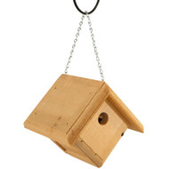 Coveside Hanging Wren House
Give wrens in your backyard a comfortable and safe shelter with this Coveside Hanging Wren House. Wrens, unlike most other birds, do not mind the gentle motion of a hanging bird house, making this compact, suspended shelter an ideal dwelling for these small feathered friends. This handsome nest box is sustainably harvested and constructed from old eastern pine to create a striking and environmentally friendly item, and the 1" entryway allows easy access for wrens while keeping out larger birds and other predators. The abode sports drainage holes in the bottom corners to keep the nest dry and clean, while ventilation holes situated along the pitched roof maintain the house at an optimal temperature. The rough hewn wood lends fledglings a safe and secure foothold for when it's time to climb out and leave the nest, and the lack of a perch near the hole further discourages predation. One side of the nest box opens easily for observation and seasonal maintenance, while the included chain link hanging loop lets you showcase this charming dwelling in your bird sanctuary with ease. Enjoy the activity of wrens while providing them a safe haven with this Hanging Wren House. Made in the USA.

Opening: 1" dia.
Dimensions: 7.5"L x 7.5"W x 7.25"H
Mounting: may be hung
Construction: pine