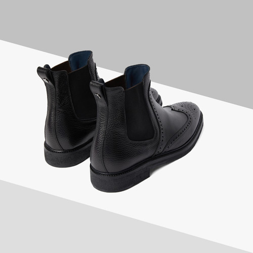 Black Beatles boots in calfskin, perforated details