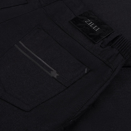 Charcoal grey trousers, elastic waistband, houndstooth patterned patch