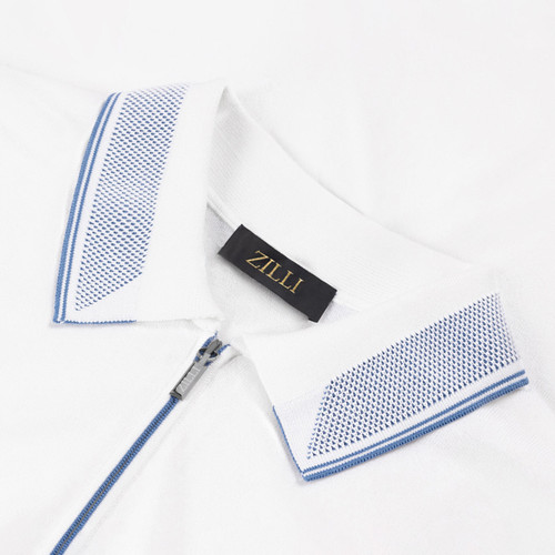 White and blue zipped polo shirt, with "ZILLI Signature" embroidery