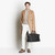 Black zippered travel bag with shoulder strap, large 'Travel Weekender' model