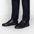 Black calfskin sneakers with crocodile details