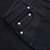 Raw blue jeans, wide fit, camel stitching