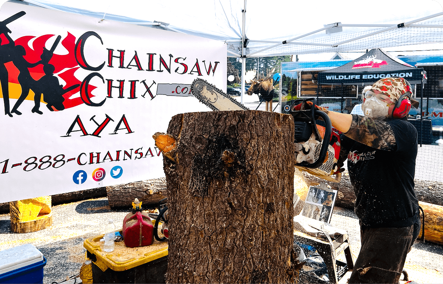 Chainsaw Chix logo featuring female chainsaw artist