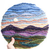 Small Round Mixed Media Fiber Art Landscape: Mountains at Dusk (12")  Rug Hooking, Punching, Needle Felting
