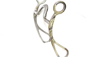 Cowpuncher 113 bit has 7 1/2" Buster Welch shanks and a 2" flat spoon port.