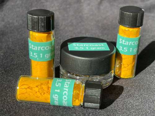 Glass vials and glass jar containing grams of Starcoast Batch 3.5 Glass vials and glass jar containing grams of Starcoast Batch 3.5