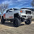 Silverado 2500HD McGaughys lift kit displayed with brackets and suspension components