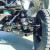 Bolt-on front travel system parts installed