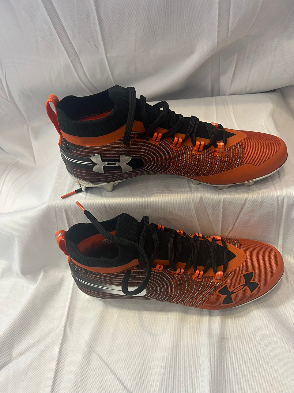under armour orange and black cleats