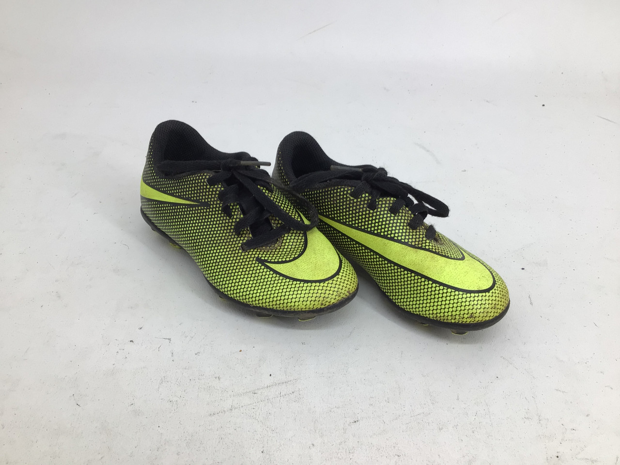 green and yellow youth football cleats