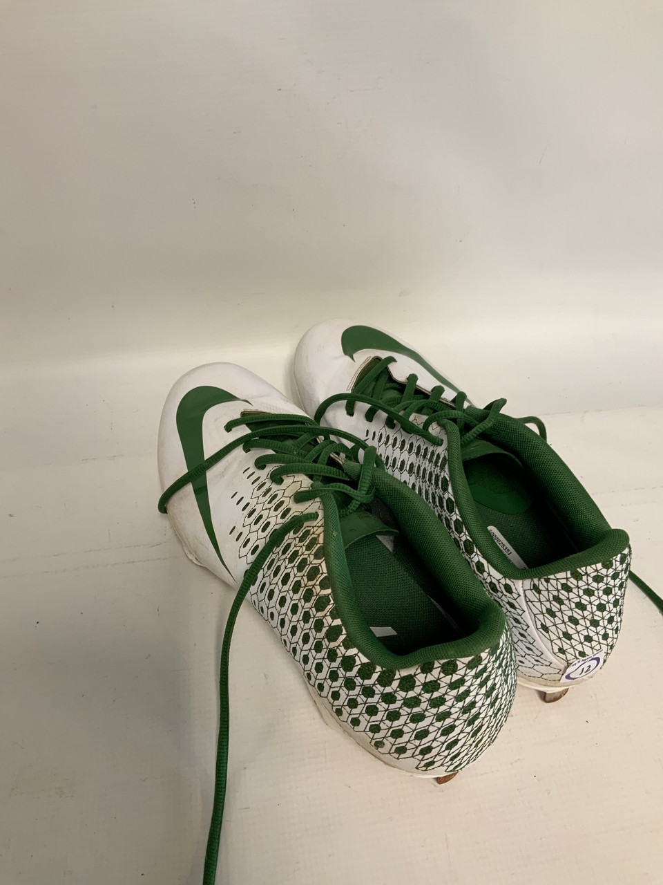 green metal softball cleats