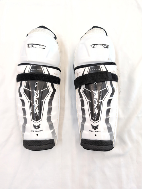 Vist Large View of Product Image Which is Used CCM ULTRA TACKS Junior Shin Guards White 10" 11651-S000385911