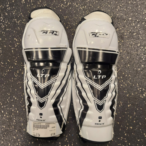 Vist Large View of Product Image Which is Used CCM LTP Youth Shin Guards White 9"