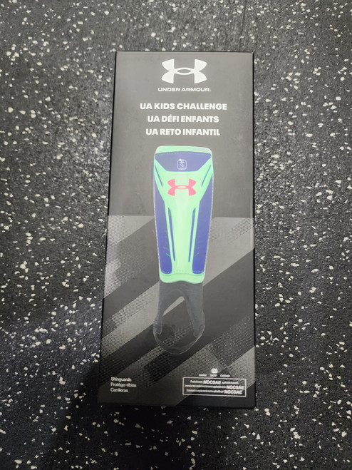 Vist Large View of Product Image Which is New Under Armour Challenge Youth Medium Shinguard Green