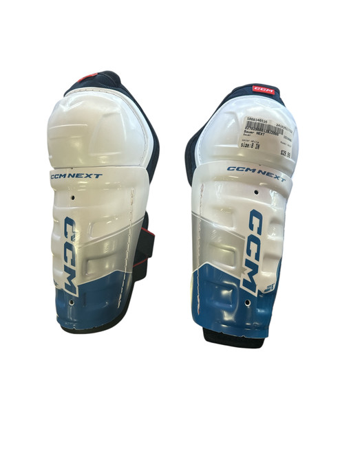 Vist Large View of Product Image Which is Used Bauer NEXT Youth Shin Guards White 8"