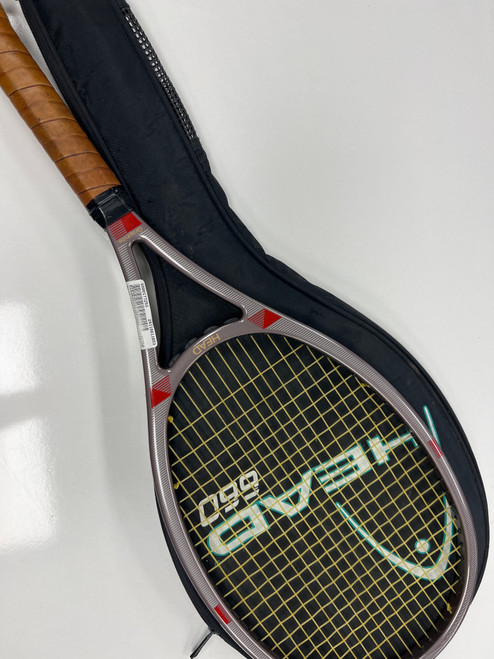Vist Large View of Product Image Which is Used Head COMPOSITE DIRECTOR Adult Tennis Racquet Grey 4 1/4"