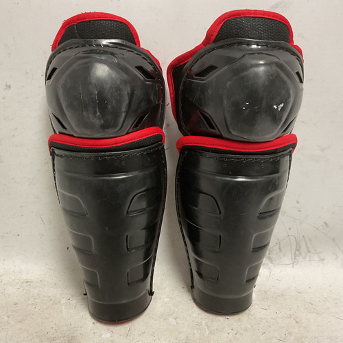Vist Large View of Product Image Which is Used CCM Youth Shin Guards Black And Red 10" 11855-S000176525
