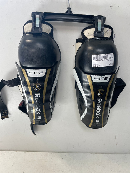 Vist Large View of Product Image Which is Used Reebok SC87 2 Youth Shin Guards Black 9" 11891-S000294146