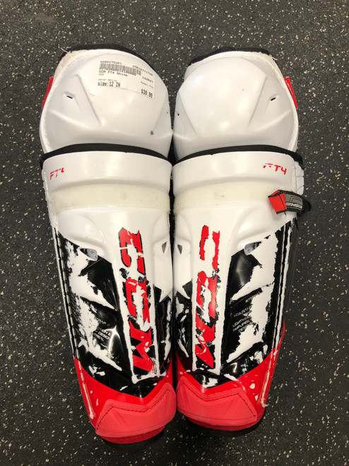 Vist Large View of Product Image Which is Used CCM FT4 Junior Shin Guards White 12"