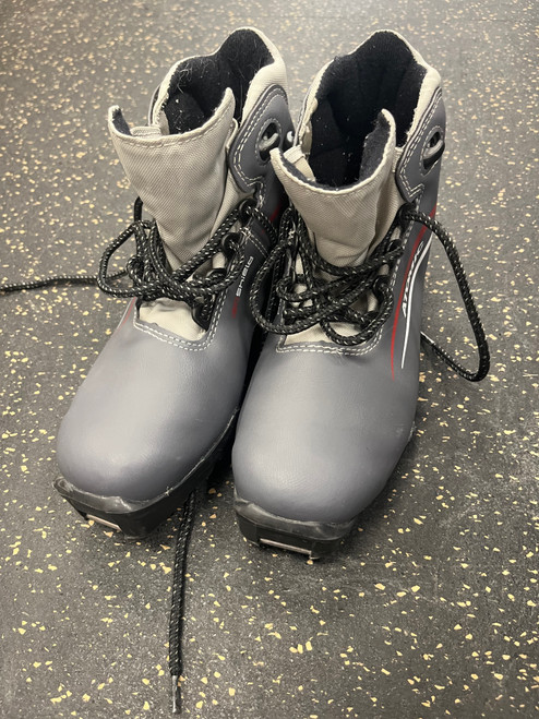Used Atomic Boys SNS XC Ski Boots Grey W 06 / JR 04-04.5 11774-S000078277 Vist Large View of Product Image Which is Used Atomic Boys SNS XC Ski Boots Grey W 06 / JR 04-04.5