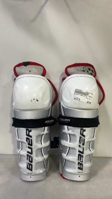 Vist Large View of Product Image Which is Used Bauer ONE 15 Junior Shin Guards White 10"