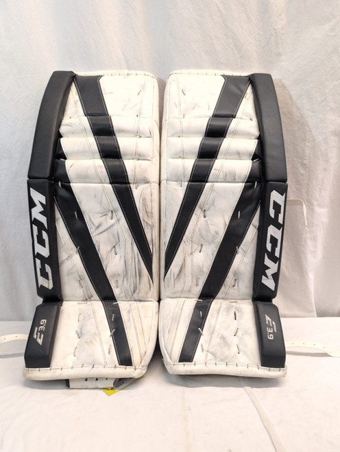 Vist Large View of Product Image Which is Used CCM EXTREME FLEX E3.9 Goalie Leg Pads Inter Black And White 31"