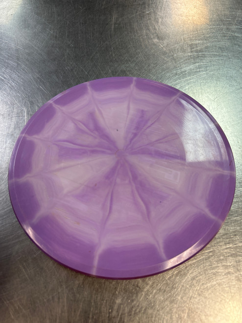 Vist Large View of Product Image Which is Used Discmania X-OUT Disc Golf Mid Range Purple