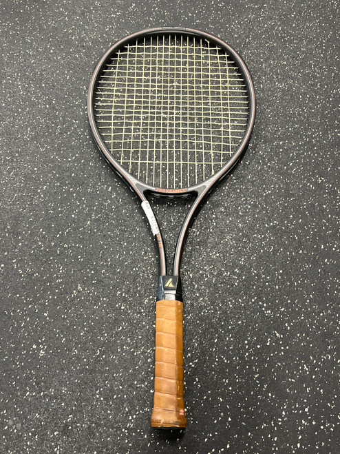 Vist Large View of Product Image Which is Used Pro Kennex COPPER PLUS 110 Adult Tennis Racquet Black 4 1/2"