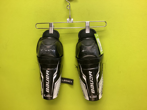 Vist Large View of Product Image Which is Used Bauer LEGACY Youth Shin Guards Black 8" 11686-S000043070