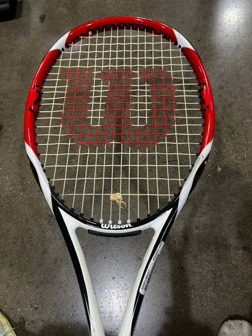 Vist Large View of Product Image Which is Used Wilson K BOLD Adult Tennis Racquet Red 4 3/8"