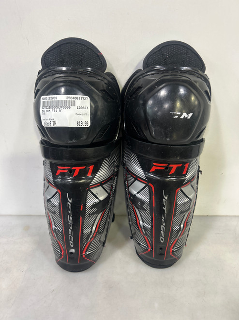 Vist Large View of Product Image Which is Used CCM FT1 Youth Shin Guards Black 9" 11727-S000192039