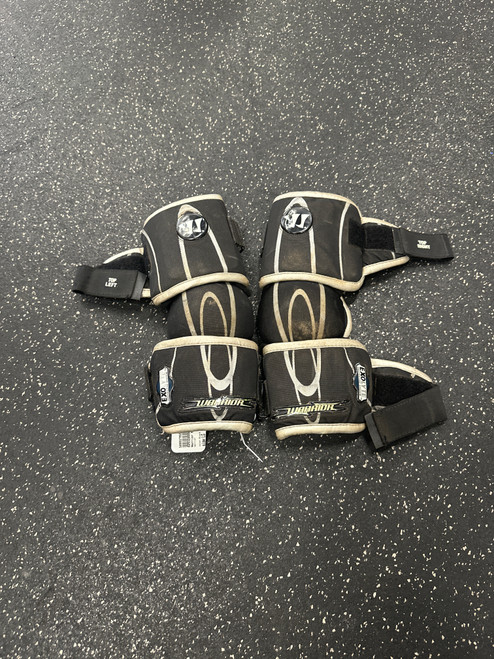 Vist Large View of Product Image Which is Used Warrior EXOLYTE ARM PADS Lacrosse Arm Pads/Guards Black LG