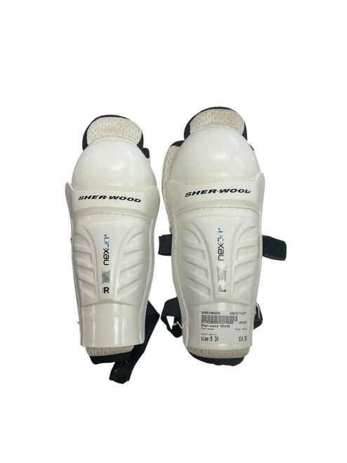 Vist Large View of Product Image Which is Used Sher-wood NEXON Youth Shin Guards White 9" 11477-S000196606