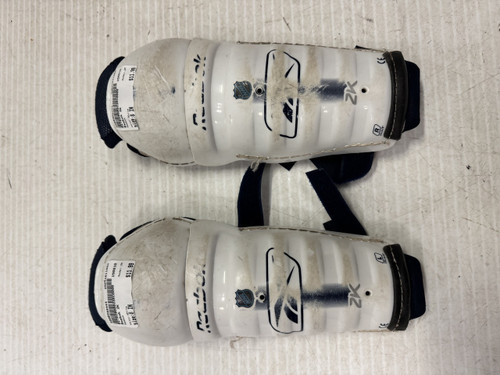 Vist Large View of Product Image Which is Used Reebok 2K Youth Shin Guards White 8"