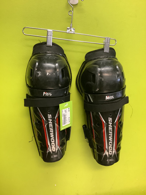 Vist Large View of Product Image Which is Used Sher-wood M65 Junior Shin Guards Black 11" 11686-S000043313