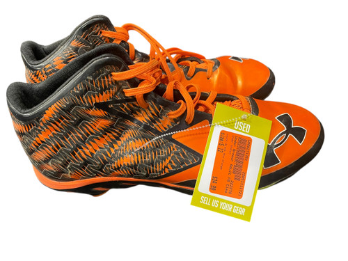 Vist Large View of Product Image Which is Used Under Armour Adult FB Cleats Black And Orange Senior 12