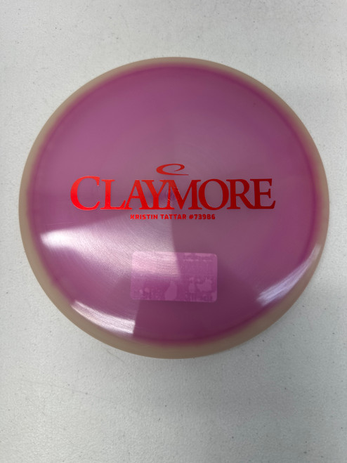 Vist Large View of Product Image Which is New Latitude 64 KRISTIN TATTAR CLAYMORE Disc Golf Putter Purple 177g