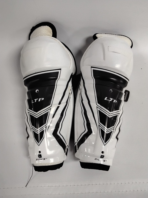Vist Large View of Product Image Which is Used CCM LTP SHIN GUARDS 8IN Youth Shin Guards White 8"